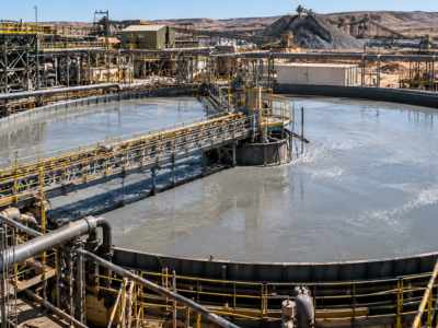 Large circular thickener with slurry and rake mechanism in a mineral processing plant
